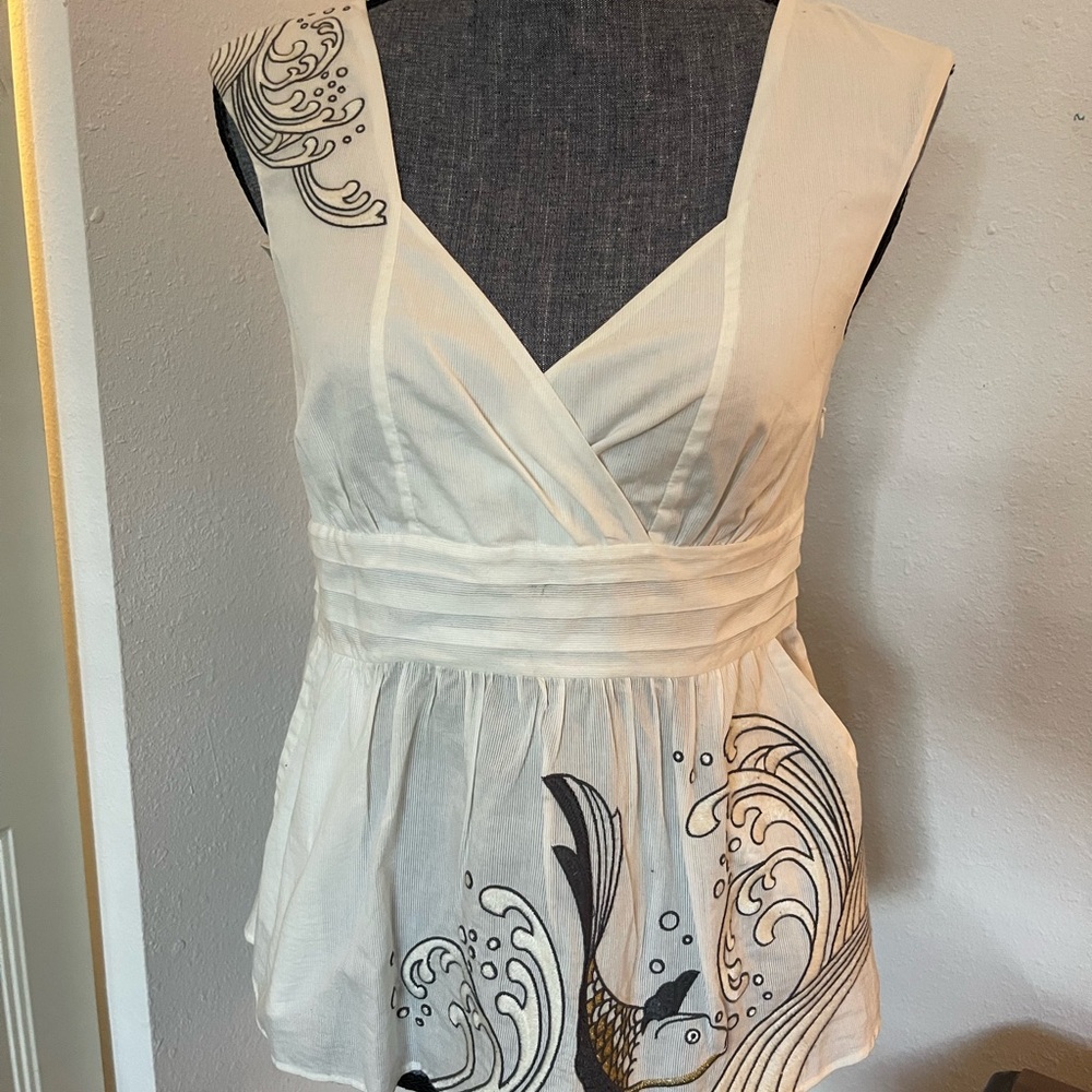 Anthropologie Cream Sleeveless Blouse with Artistic Design